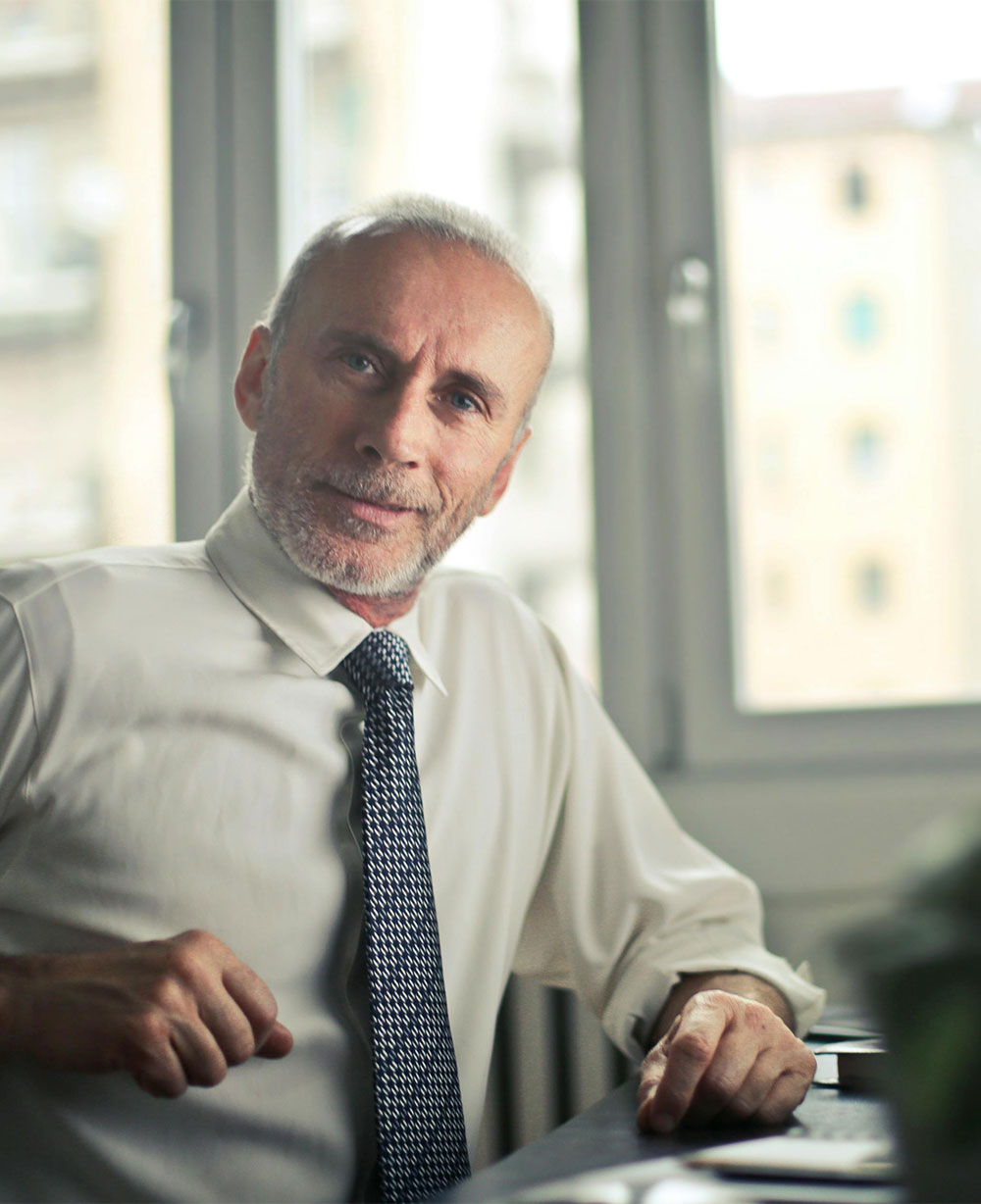 homepage-p-1000w-v1 An image of Guy Mills, Leadership Coach